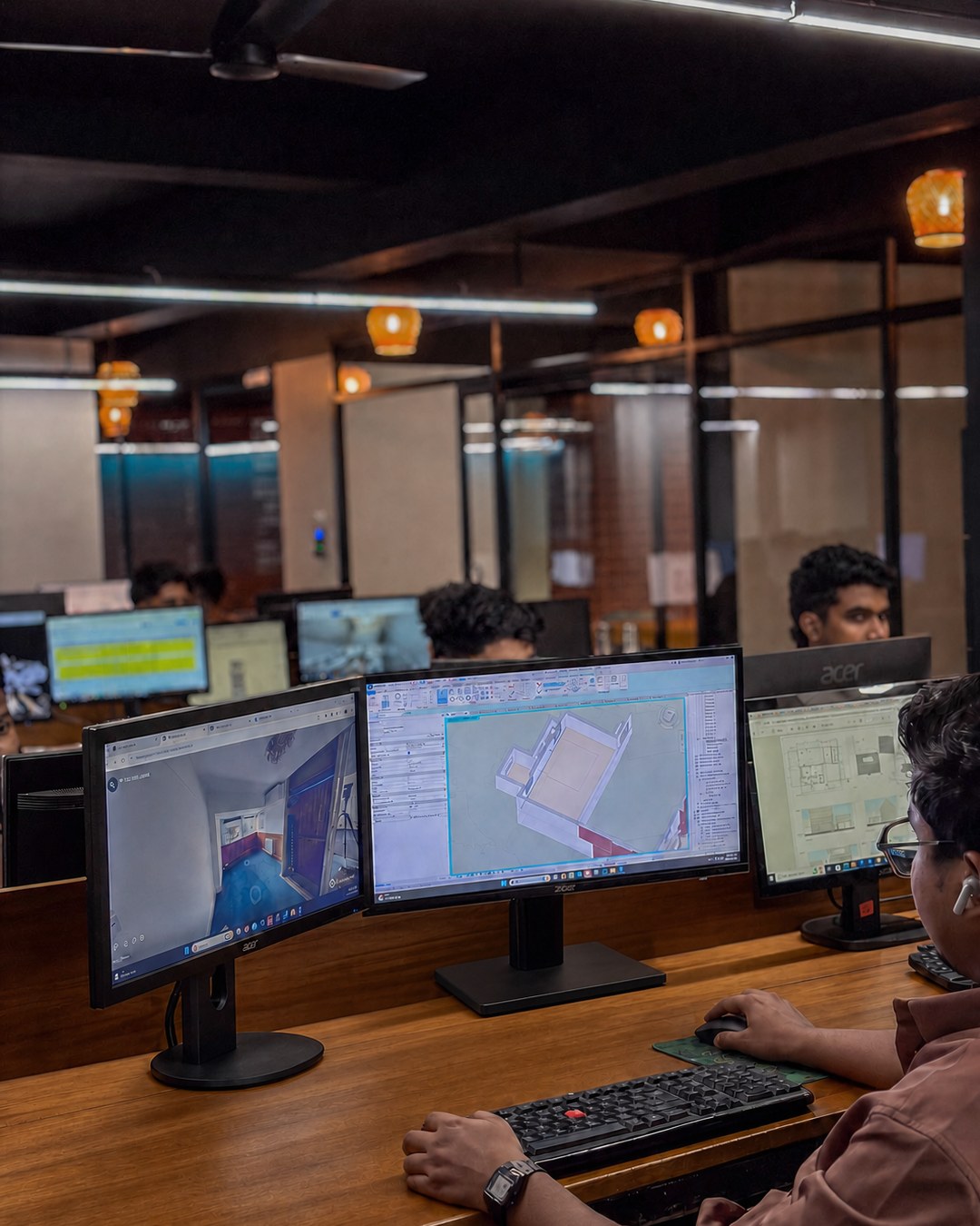 MJ Designs BIM production team working across coordinated workstation screens